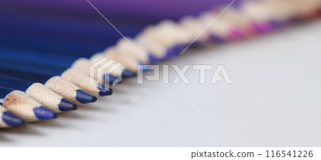 Set of blue identical pencils lie in raw Set of blue identical pencils lie in raw 116541226
