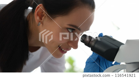 Pharmacy scientist working with professional microscope in technology lab Pharmacy scientist working with professional microscope in technology lab 116541921