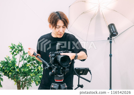 Creators shooting videos in the studio 116542026