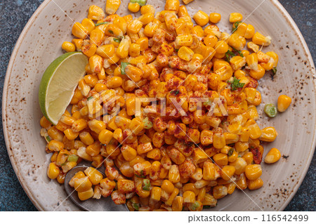 Esquites mexican street corn salad with chili, cilantro and lime juice Esquites mexican street corn salad with chili, cilantro and lime juice 116542499