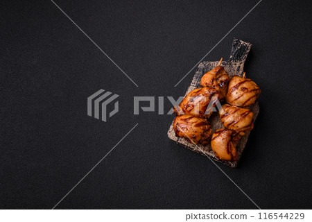 Delicious baked chicken or turkey shish kebab on a skewer Delicious baked chicken or turkey shish kebab on a skewer 116544229