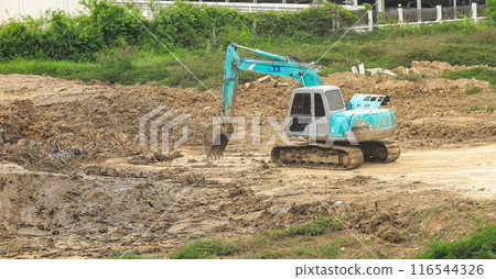 Earth drill, pneumatic drill, excavator work in construction site. Earth drill, pneumatic drill, excavator work in construction site. 116544326