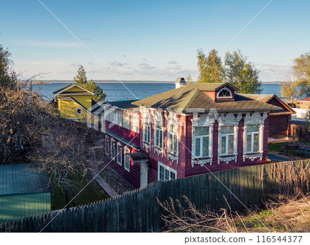 Springtime in old traditional russian town Rostov with wooden houses 116544377