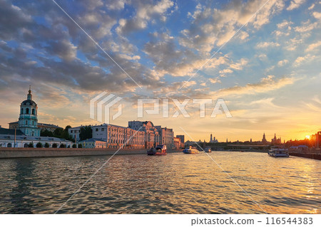 Fantastic fiery sunset over Moscow river. Fantastic fiery sunset over Moscow river. 116544383