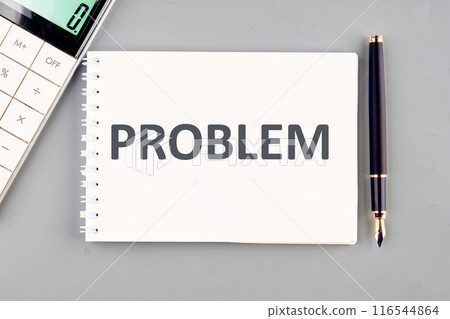 PROBLEM written in a notebook on a gray background PROBLEM written in a notebook on a gray background 116544864