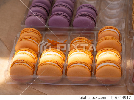 Macarons, also known as macarons, macaroons. Color round French dessert cookie, almond meringue Macarons, also known as macarons, macaroons. Color round French dessert cookie, almond meringue 116544917