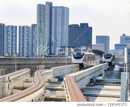 The pink monorail Mass Transit System serving in the Metropolitan Region. 116545371