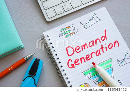 Handwritten notes in a notebook about marketing demand generation. Handwritten notes in a notebook about marketing demand generation. 116545412