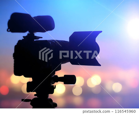 Silhouette of a professional studio video camera. Preparation and release of news. 116545960