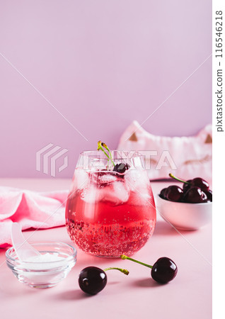 Non-alcoholic cocktail for a good sleep with cherry juice and magnesium in a glass vertical view Non-alcoholic cocktail for a good sleep with cherry juice and magnesium in a glass vertical view 116546218