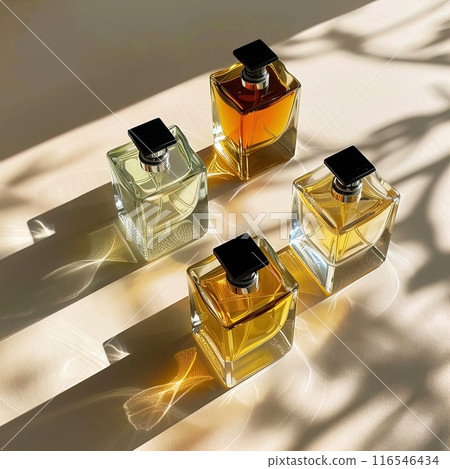 Elegant Perfume Bottles displayed in sunlight, reflecting beauty and sophistication 116546434