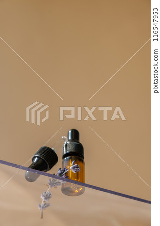 Low angle view of lavender essential oil. Aromatherapy scene natural home fragrance perfumery oil. Wild grown plant herbal ingredient oil. Isometric Low angle view of lavender essential oil. Aromatherapy scene natural home fragrance perfumery oil. Wild grown plant herbal ingredient oil. Isometric 116547953