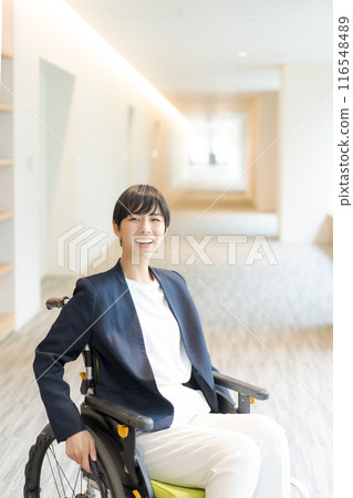 Young woman in a wheelchair Young woman in a wheelchair 116548489