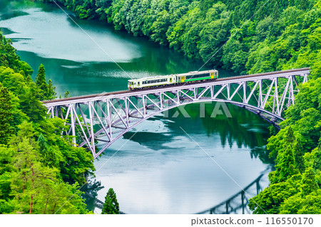 Fukushima Tadami Line: A train crossing the First Tadami River Bridge 116550170