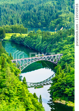 Fukushima Tadami Line: A train crossing the First Tadami River Bridge Fukushima Tadami Line: A train crossing the First Tadami River Bridge 116550416