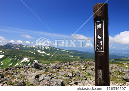 Summer Daisetsuzan: Mt. Midori-dake summit sign, Mt. Tomuratushi, Takanegahara, and the Tokachi mountain range Summer Daisetsuzan: Mt. Midori-dake summit sign, Mt. Tomuratushi, Takanegahara, and the Tokachi mountain range 116556507