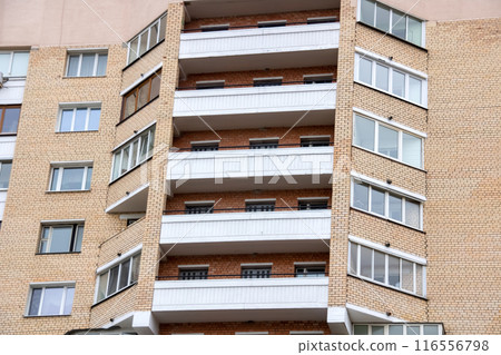 Upper floors of a tall old building Upper floors of a tall old building 116556798