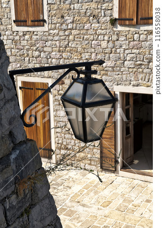 Old street lantern in medieval town 116558038