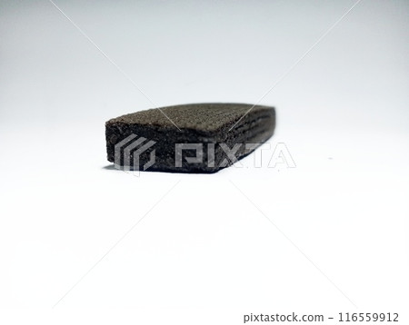 Dark brown wafer on isolated white background  116559912