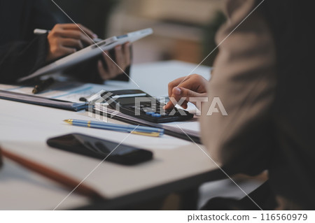 Consultation and conference of lawyers and professional businessman working and discussion having at law firm in office. Concepts of law, Judge gavel with scales of justice. 116560979