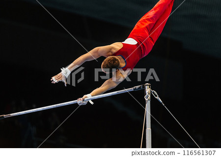 gymnast exercise horizontal bar in championship gymnastics, element zou li min gymnast exercise horizontal bar in championship gymnastics, element zou li min 116561307