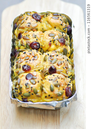 bread or bun with raisin stuffed or raisin bun 116561319