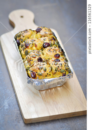 bread or bun with raisin stuffed or raisin bun 116561329