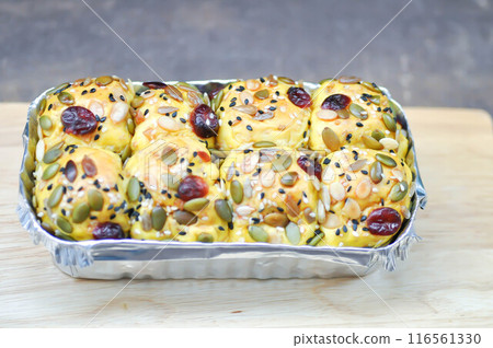 bread or bun with raisin stuffed or raisin bun 116561330
