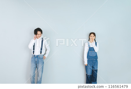 Couple photo of a man and woman wearing denim Couple photo of a man and woman wearing denim 116561479