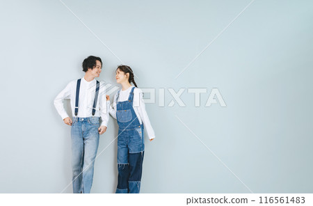 Couple photo of a man and woman wearing denim 116561483