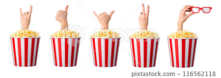 Female hand sticks out of a bucket with popcorn isolated on white background 116562118