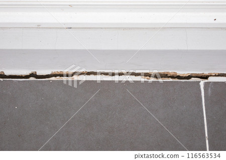 cracked concrete floor of the house cracked concrete floor of the house 116563534