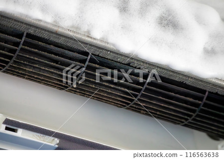 air conditioner cleaning with spray foam cleaner 116563638