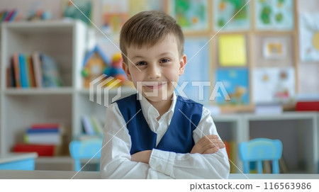 Smiling Russian Schoolboy in Classroom with Arm Crossed, Focused on Childhood Education, Learning, and Diversity 116563986