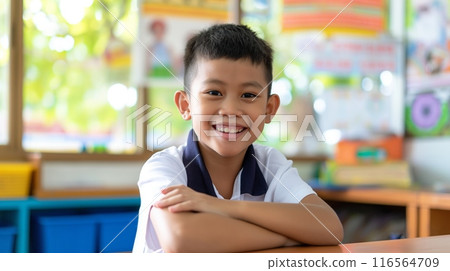 Southeast Asian Elementary School Boy Smiling Brightly, Classroom Setting, Education Concept, Back to School 116564709