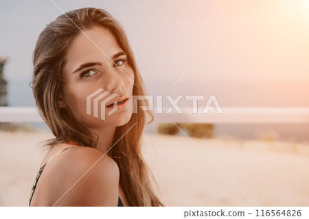 Happy woman portrait in cafe. Boho chic fashion style. Outdoor photo of young happy woman with long hair, sunny weather outdoors sitting in modern cafe. 116564826