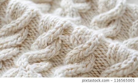 Detailed Close-Up of Beige Knit Wool Fabric, Ideal for Textural Design, Warm Apparel, and Cozy Home Decor 116565005