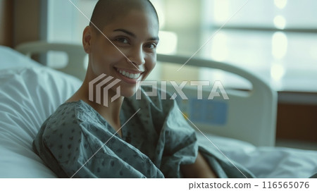 Latina Woman in 30s with Shaved Head, Smile, Hospital Bed, Medical Environment, Diverse Healthcare, Professional Stock Photography 116565076