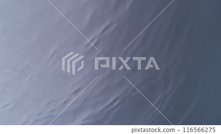 Freeze motion of splashing water surface on dark background 116566275