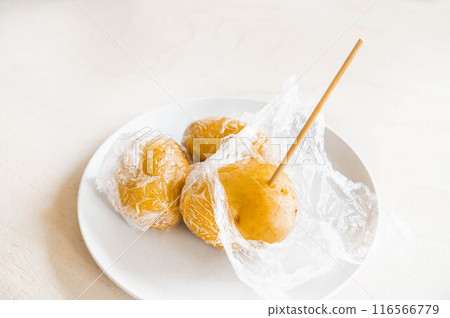 Potatoes microwaved to check if cooked through 116566779