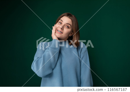 Woman in Blue Sweater Posing for Picture 116567187