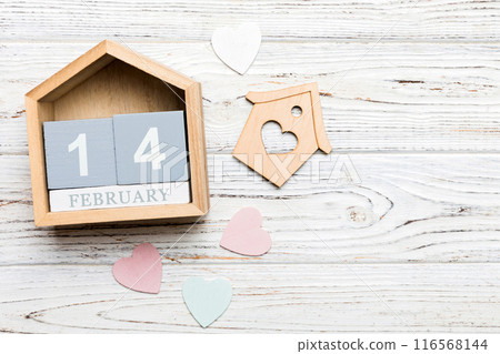 Valentine Day theme with wooden block calendar. Greeting card template for Valentines Day copy space for text Valentine Day theme with wooden block calendar. Greeting card template for Valentines Day copy space for text 116568144