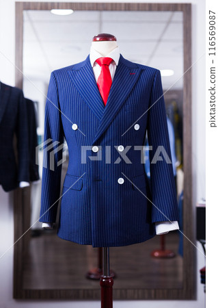 Chic Male costume on a mannequin in men clothing store 116569087