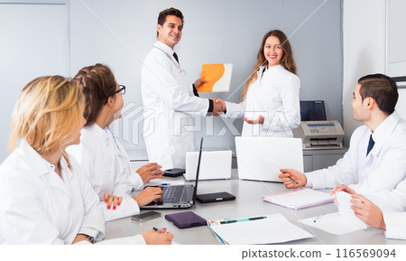 Congratulation of a female young doctor 116569094