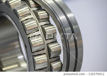 Close up scene the disassembly spherical roller bearing parts. Close up scene the disassembly spherical roller bearing parts. 116570912