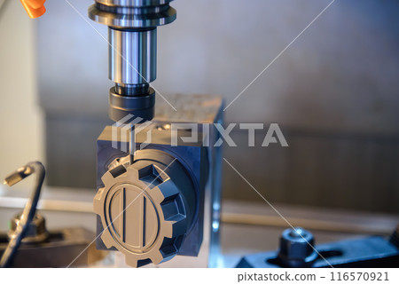 The CNC milling machine cutting the graphite electrode parts by solid ball end mill tools. The CNC milling machine cutting the graphite electrode parts by solid ball end mill tools. 116570921