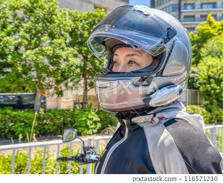 Female rider touring Yokohama 116571230