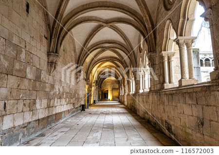 Interior of Alcobaca monastery, Mosteiro de Santa Maria de Alcobaca in Portugal. A Medieval Roman Catholic Monastery Interior of Alcobaca monastery, Mosteiro de Santa Maria de Alcobaca in Portugal. A Medieval Roman Catholic Monastery 116572003