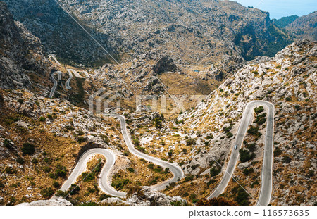 A breathtaking view of the serpentine road in Majorca. A breathtaking view of the serpentine road in Majorca. 116573635