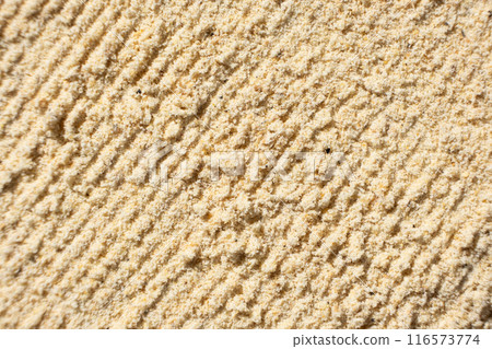 Abstract beige ground ginger background. Creativity in cooking. Abstract beige ground ginger background. Creativity in cooking. 116573774